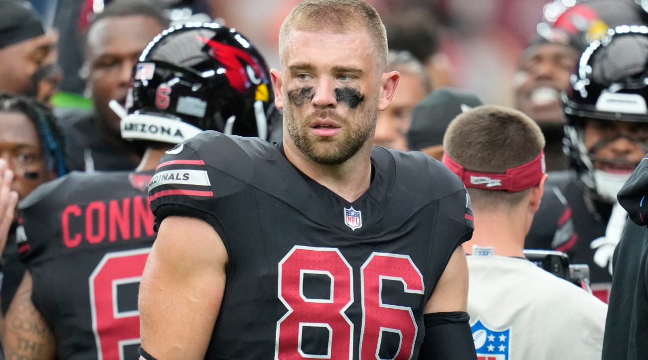 FILE - Arizona Cardinals tight end Zach Ertz pauses on the field prior to an NFL football game against the Cincinnati Bengals Sunday, Oct. 8, 2023, in Glendale, Ariz. The Arizona Cardinals released veteran tight end Zach Ertz on Thursday, Nov. 30, clearing the way for the rapidly-improving Trey McBride to assume the starting role. The 33-year-old Ertz is a three-time Pro Bowl selection who has spent the past five games on injured reserve with a quadriceps injury. (AP Photo/Ross D. Franklin, File)   
